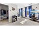 Comfortable bedroom featuring a closet, large windows with blue curtains, and themed wall decor at 1212 Croft Dr, Fort Mill, SC 29708