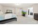 Bright bedroom with walk-in closet and ensuite bathroom provides an excellent retreat for relaxation at 1212 Croft Dr, Fort Mill, SC 29708