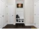 Mud room area featuring a built-in bench, storage cubbies, and hooks for organization, providing a practical entry space at 1212 Croft Dr, Fort Mill, SC 29708