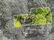 Aerial view showcasing the property's boundaries surrounded by mature trees, ensuring privacy and tranquility at 1220 Oakwood Ave, Gastonia, NC 28052