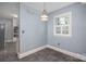 Cozy dining area with modern light fixture at 1220 Oakwood Ave, Gastonia, NC 28052