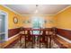 Dining room with hardwood floors, wainscoting, and a large window at 1220 Oakwood Ave, Gastonia, NC 28052