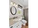 Well-maintained bathroom featuring granite countertops, updated fixtures, and a classic design at 12531 Kane Alexander Dr, Huntersville, NC 28078