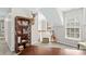 Bright room with a deer head, guitar, shelving, and sloped ceilings at 12531 Kane Alexander Dr, Huntersville, NC 28078