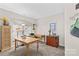 Well-lit home office with multiple work spaces and a neutral color palette at 12531 Kane Alexander Dr, Huntersville, NC 28078