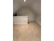 Bright attic space features neutral walls and carpet, offering potential for versatile use at 127 Victoria Park Dr, Shelby, NC 28150