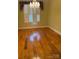 Bright room featuring hardwood floors and shuttered windows at 127 Victoria Park Dr, Shelby, NC 28150