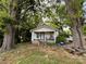 Inviting single-story home nestled amongst mature trees, featuring a cozy front porch at 142 26Th Sw St, Hickory, NC 28602