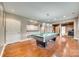 Basement recreation area featuring a pool table and open access to media and bar areas at 1813 Robbins Meadows Dr, Waxhaw, NC 28173
