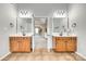 En-suite bathroom with dual vanity sinks, and plenty of light at 1813 Robbins Meadows Dr, Waxhaw, NC 28173