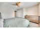 This cozy bedroom features a ceiling fan and carpet flooring at 1813 Robbins Meadows Dr, Waxhaw, NC 28173