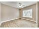Bedroom with new laminate flooring and a large window, showcasing natural light at 1813 Robbins Meadows Dr, Waxhaw, NC 28173
