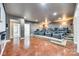 Home theater featuring tiered seating with leather recliners and a projector setup at 1813 Robbins Meadows Dr, Waxhaw, NC 28173
