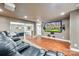 Home theater room with a large screen and adjacent wet bar and billiards area at 1813 Robbins Meadows Dr, Waxhaw, NC 28173