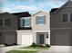 Charming townhome with a one-car garage, landscaped front yard, and inviting entryway at 1940 Old Rivers Rd, Concord, NC 28027