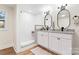 Modern bathroom with double vanity, granite countertops, sleek fixtures, and tiled shower at 205 Jim Patterson Rd, Kings Mountain, NC 28086
