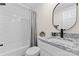 Bathroom featuring granite countertops, a tub with shower, and modern finishes at 205 Jim Patterson Rd, Kings Mountain, NC 28086