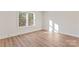 Bedroom featuring wood floors, natural light from large window and white trim at 205 Jim Patterson Rd, Kings Mountain, NC 28086