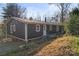 Exterior view of a cozy home featuring a quaint porch and well-maintained landscaping at 205 Jim Patterson Rd, Kings Mountain, NC 28086