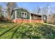 Exterior of a cozy home featuring a quaint porch and a brick foundation at 205 Jim Patterson Rd, Kings Mountain, NC 28086