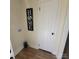 Mudroom features vinyl floors, washer/dryer hookups, and white door at 205 Jim Patterson Rd, Kings Mountain, NC 28086