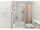 Bright bathroom features a shower-tub combination and modern fixtures at 211 Killian Rd, Stanley, NC 28164