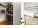 Spacious garage with organizational shelving on one wall, and a kayak on the other wall at 211 Killian Rd, Stanley, NC 28164