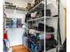 Large storage room with shelving and containers ready for organization at 211 Killian Rd, Stanley, NC 28164