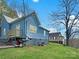 Back of the house showing a raised deck, siding, and basement access at 2210 22Nd Avenue Se Ct, Hickory, NC 28602