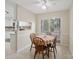 Charming dining area with a round wooden table and a sliding glass door offering natural light at 2248 Lawton Bluff Rd, Charlotte, NC 28226