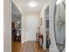Inviting hallway offering views of the dining room and front yard, connecting different spaces at 2248 Lawton Bluff Rd, Charlotte, NC 28226