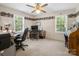 Spacious office featuring neutral walls, two windows, and a traditional desk setup at 2248 Lawton Bluff Rd, Charlotte, NC 28226