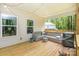 Relaxing covered deck area with comfortable seating and pleasant backyard views at 2402 Winfield St, Kannapolis, NC 28083