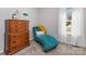 Cozy room features a comfortable chaise lounge, dresser and carpeted floor at 2402 Winfield St, Kannapolis, NC 28083