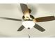 Updated dark bronze ceiling fan featuring a bowl light and matching blades at 2415 Christenbury Hall Nw Dr, Concord, NC 28027