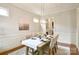 Chic dining room featuring elegant table setting and wainscoting at 2415 Christenbury Hall Nw Dr, Concord, NC 28027