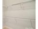 Walk-in closet with wire shelving and ample storage space at 2415 Christenbury Hall Nw Dr, Concord, NC 28027