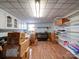 Finished basement features lots of storage, shelving and vinyl floors at 24436 Nc 24/27 Hwy, Albemarle, NC 28001