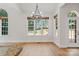 Bright dining area with natural light and views of the backyard at 255 Honeysuckle Creek Loop, Mooresville, NC 28117