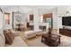 Inviting living area seamlessly connects a cozy seating area with a modern kitchen at 255 Honeysuckle Creek Loop, Mooresville, NC 28117