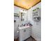 Bathroom featuring modern vanity, mirror, and shelving at 2710 Wyatt Grove Church Rd, Richfield, NC 28137