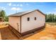 Side view of a metal building with brown and white paneling at 2710 Wyatt Grove Church Rd, Richfield, NC 28137