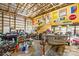 Spacious garage with high ceilings, storage, and signs at 2710 Wyatt Grove Church Rd, Richfield, NC 28137