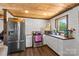 The kitchen features stainless steel appliances, white cabinets, and butcher block countertops at 2710 Wyatt Grove Church Rd, Richfield, NC 28137