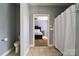Bathroom view to bedroom with modern fixtures and tile flooring at 28926 Hartsell Rd, Albemarle, NC 28001