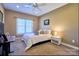 Bright bedroom with a single bed, natural light, and a functional workspace at 28926 Hartsell Rd, Albemarle, NC 28001
