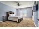 Serene bedroom with a large window, plush carpet, and ample space for relaxation at 28926 Hartsell Rd, Albemarle, NC 28001