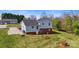 Expansive backyard featuring a well-maintained lawn and a cozy seating area, perfect for outdoor relaxation at 2948 Christy Leigh Dr, Newton, NC 28658