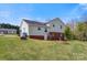 Spacious backyard features lush green grass and a great area for entertaining at 2948 Christy Leigh Dr, Newton, NC 28658