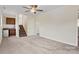 Spacious bedroom with stairs, wet bar, and neutral carpet at 2948 Christy Leigh Dr, Newton, NC 28658